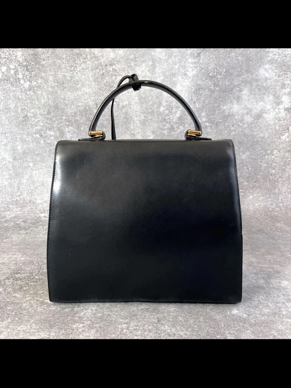 Gucci Black Leather Top-Handle Satchel with Gold Hardware Accent
